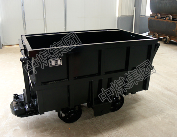 曲軌側卸式礦車